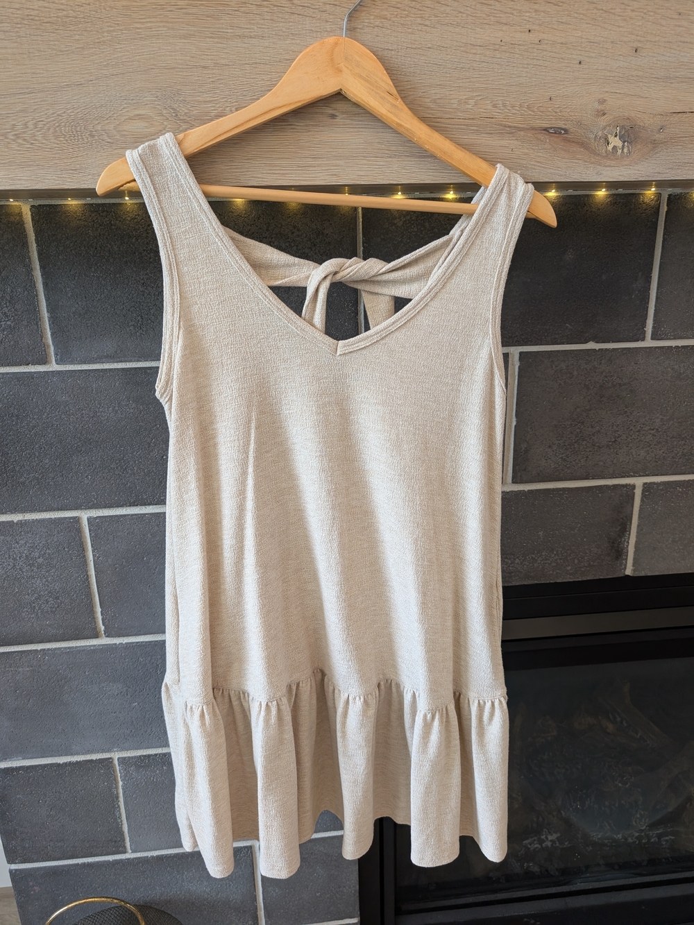 Lush Sleeveless Tie-Back Ruffle-Hem Mini Dress in Light Beige